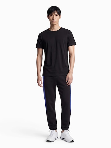 Nike Sportswear Дънки Tapered Leg Панталон 'TECH FLC PRO' в черно