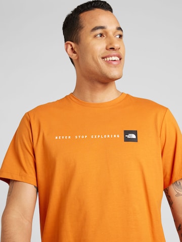 T-Shirt 'NEVER STOP EXPLORING' THE NORTH FACE en marron