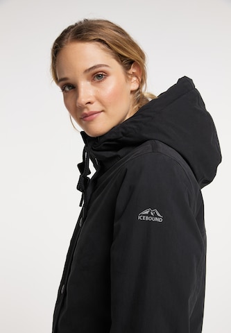 ICEBOUND Raincoat in Black