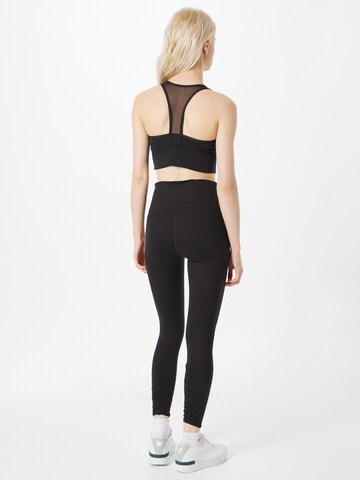 PUMA Skinny Sports trousers 'Studio Foundation' in Black