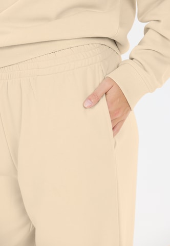 Athlecia Regular Sports trousers 'Crecy' in Beige