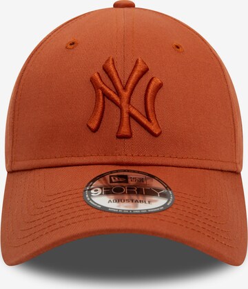 Cappello da baseball 'LEAGUE ESS 9FORTY NEYYAN' di NEW ERA in arancione