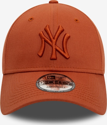 Cappello da baseball 'LEAGUE ESS 9FORTY NEYYAN' di NEW ERA in arancione