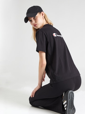 Maglietta di Champion Authentic Athletic Apparel in nero