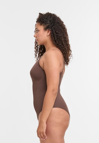 Body Lykkeland Atelier en marron