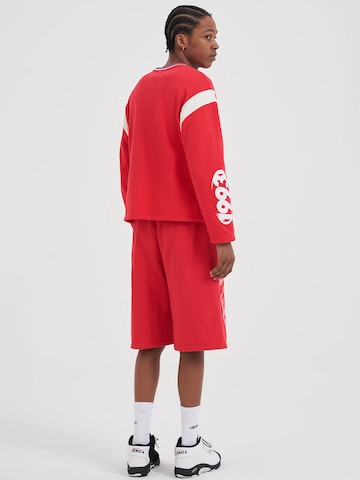 AND1 Bluzka sportowa w kolorze czerwony