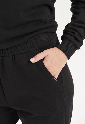 ENDURANCE Tapered Sports trousers 'Beisty' in Black