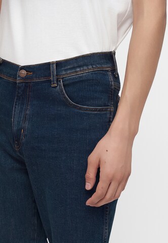 Coupe slim Jean 'TEXAS' WRANGLER en bleu