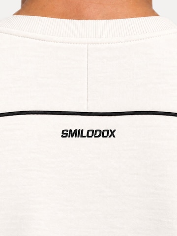 Sweat-shirt 'Brenvaro' Smilodox en beige