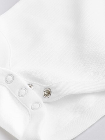 Tutina / body per bambino di Next in bianco
