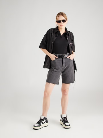 Noisy may Poloshirt 'PASA' in Schwarz