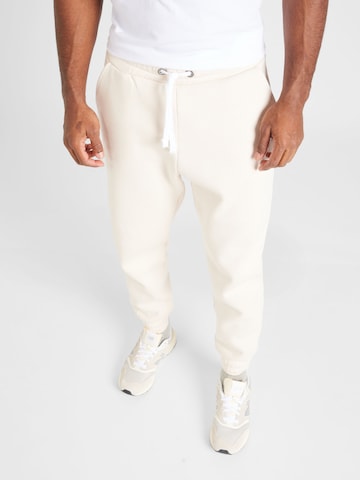 ALPHA INDUSTRIES Tapered Broek in Wit: voorkant