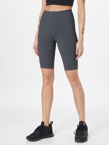 Skinny Pantalon de sport SKECHERS en gris : devant