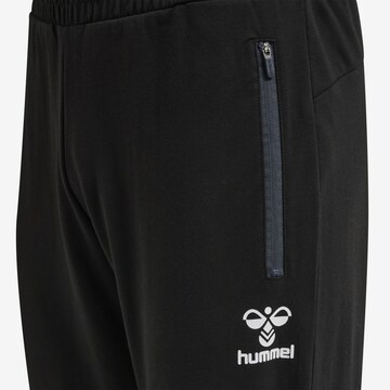 Hummel Zwężany krój Spodnie sportowe 'Ray 2.0' w kolorze czarny