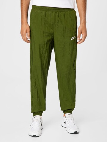 Nike Sportswear Костюм для бега в Зеленый