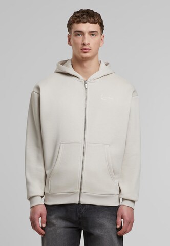 Veste de survêtement 'Essential' Karl Kani en beige : devant