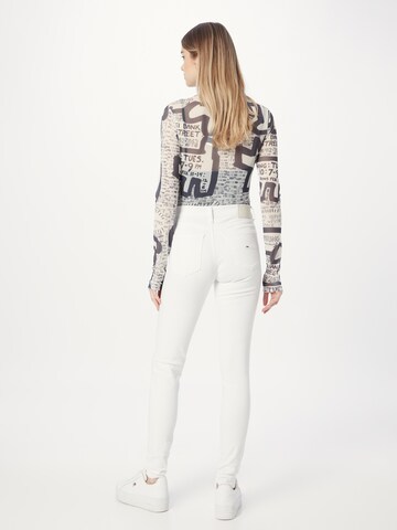 Skinny Jeans 'NORA' di Tommy Jeans in bianco