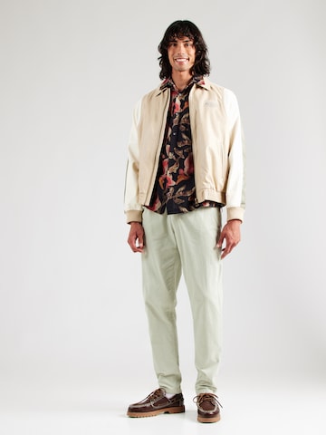 Tommy Jeans Tapered Hose 'ISAAC' in Grün