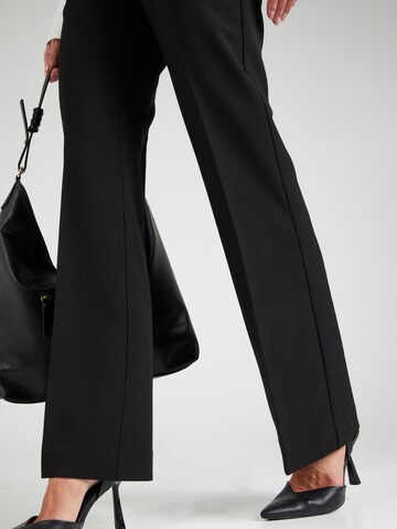 SOAKED IN LUXURY Flared Trousers with creases 'Corinne' in Black