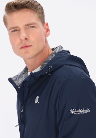 Veste fonctionnelle Schmuddelwedda en bleu