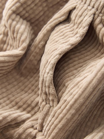 Next Zwężany krój Spodnie w kolorze beżowy