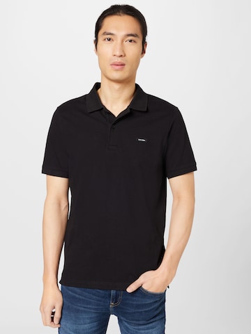 Calvin Klein - Camiseta en negro: frente