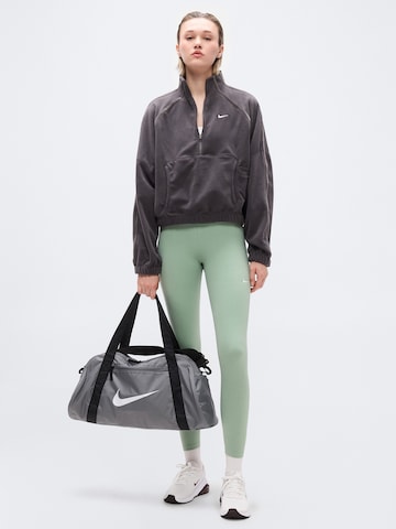 Skinny Pantalon de sport 'ONE' NIKE en vert