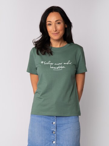 T-shirt 'Früher War Mehr Lametta' Watapparel en vert : devant