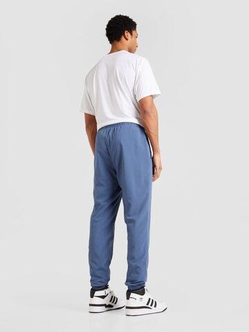 ADIDAS SPORTSWEAR Tapered Workout Pants in Blue