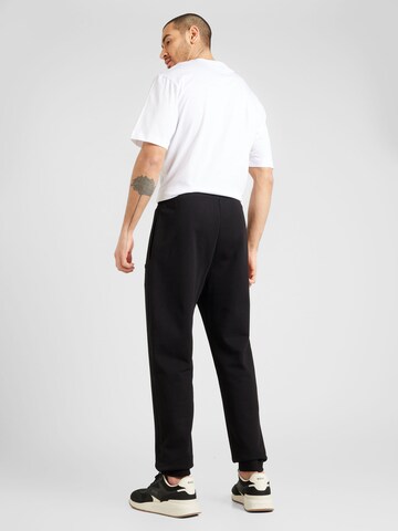 HUGO - Tapered Calças 'Napin' em preto