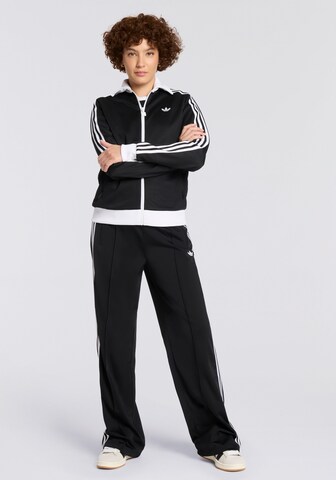 Wide leg Pantaloni di ADIDAS ORIGINALS in nero