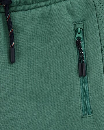 WE Fashion Regular Housut värissä vihreä