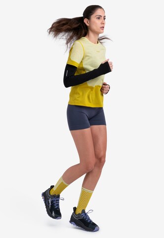 ICEBREAKER - Camiseta funcional 'Energy Wind' en amarillo