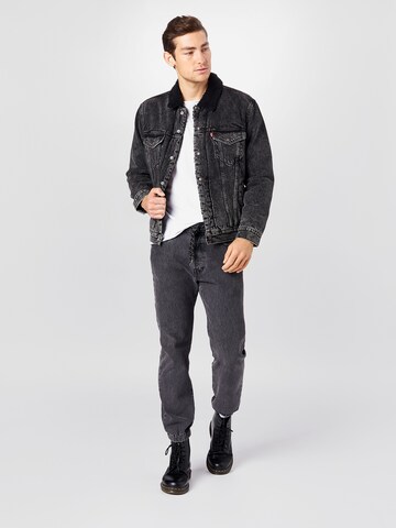 LEVI'S ® Übergangsjacke 'Type 3 Sherpa Trucker' in Schwarz