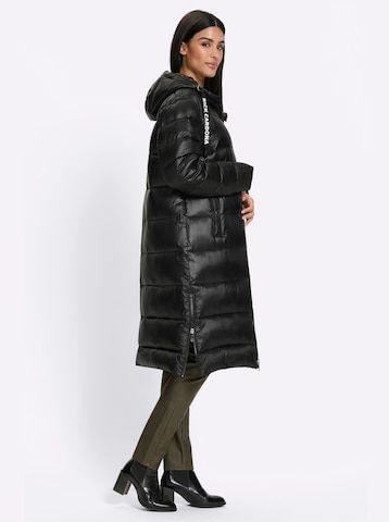 Cappotto invernale di heine in nero
