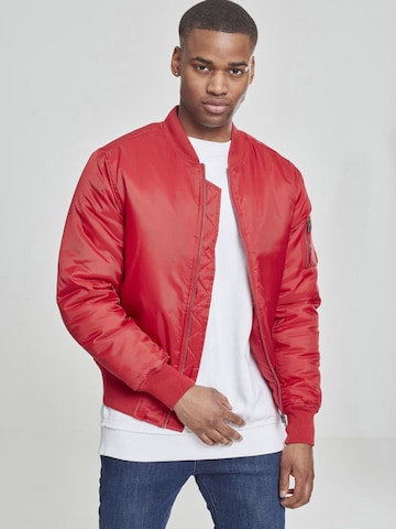 Veste mi-saison Urban Classics en rouge : devant