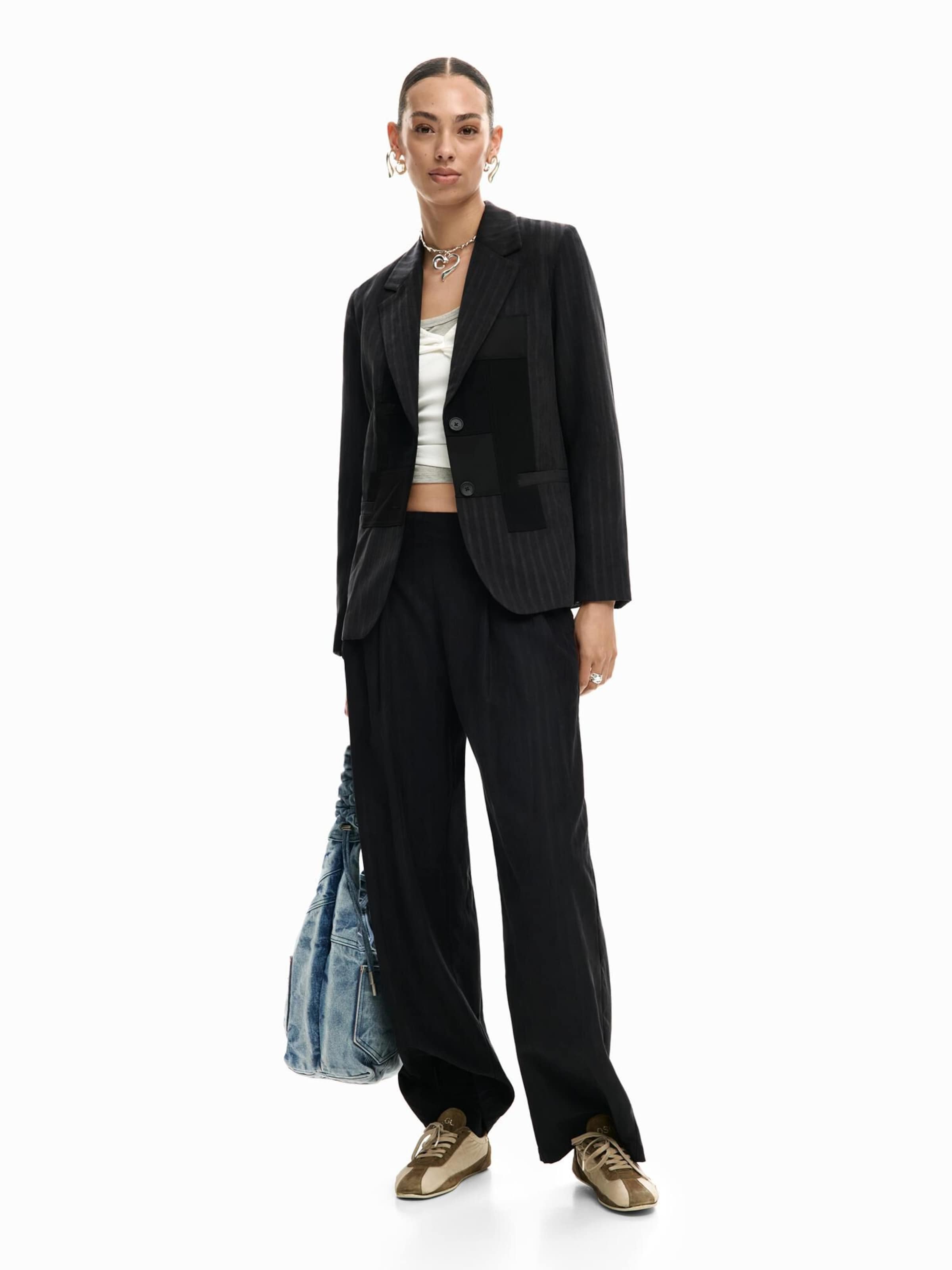 Wide leg Pantaloni con pieghe di Desigual in nero