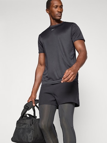 Reebok - Camisa funcionais 'ID TRAIN' em preto