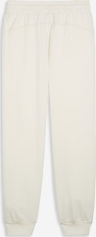 PUMA Zwężany krój Spodnie sportowe w kolorze beżowy