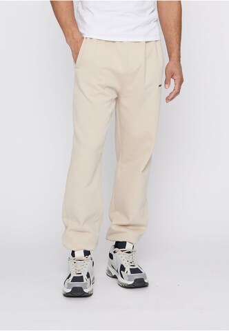Pegador - Tapered Pantalón en beige: frente