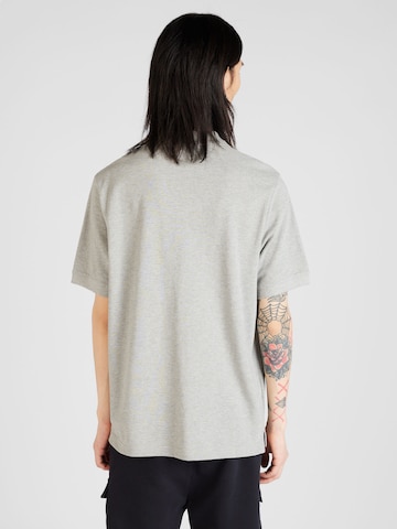T-Shirt 'CLUB' Nike Sportswear en gris