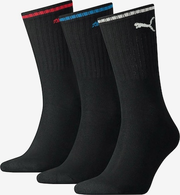 PUMA - Calcetines deportivos en negro: frente