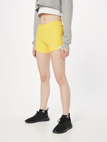 ADIDAS SPORTSWEAR Slimfit Sportbroek 'Lounge Rib Booty' in Geel: voorkant