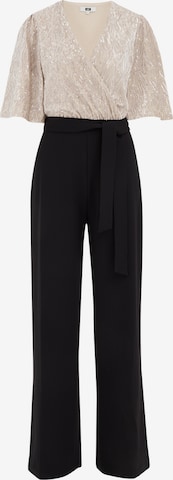 Salopeta de la WE Fashion pe bej: față