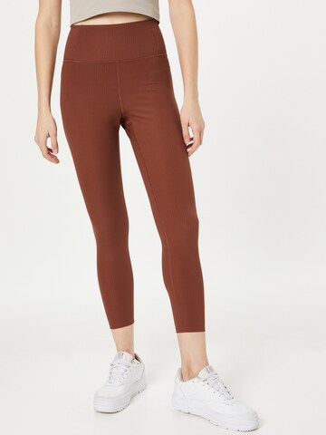 Skinny Pantalon de sport Girlfriend Collective en marron : devant