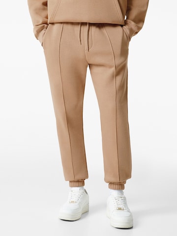 Bershka Avsmalnet Bukse i beige: forside