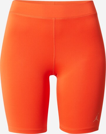 Jordan Skinny Workout Pants in Orange: front