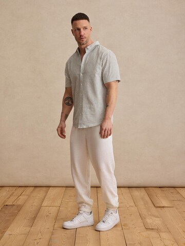 DAN FOX APPAREL Tapered Παντελόνι 'Gino' σε λευκό