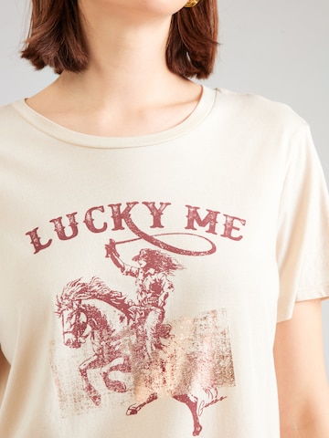 Tricou 'COWGIRL' de la GUESS pe bej