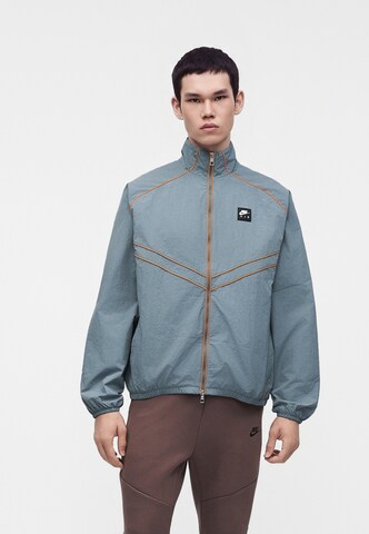 Nike Sportswear Övergångsjacka 'AIR' i grå: framsida